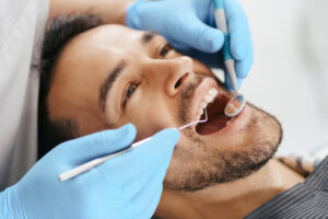 Dental check-up to prevent risks of gum disease.